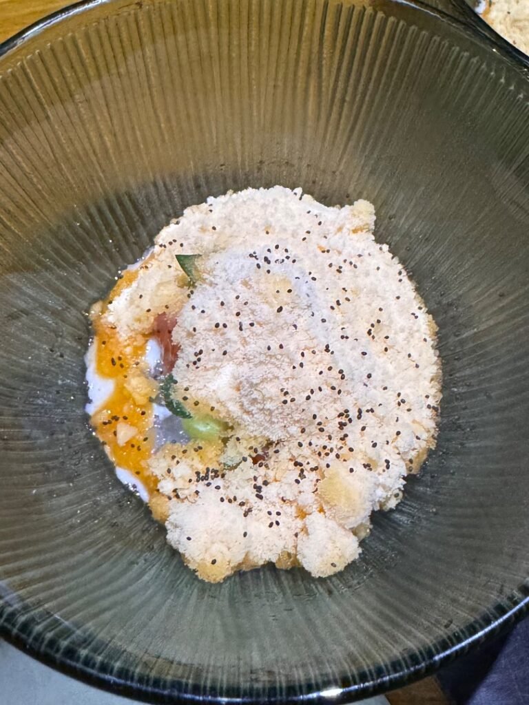  Curry. It consisted of red snapper, grapefruit, raw mango, and was topped with poppy seeds